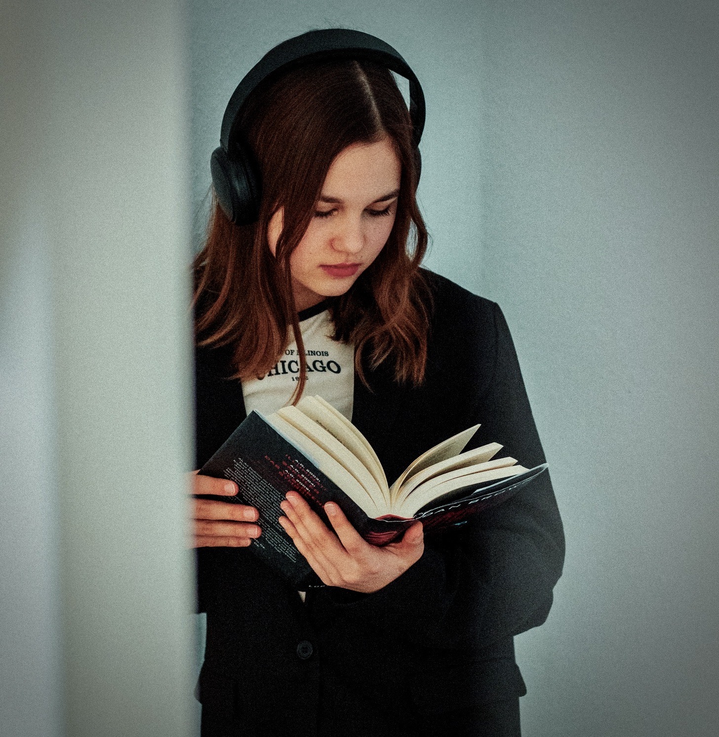 teenager reading a book